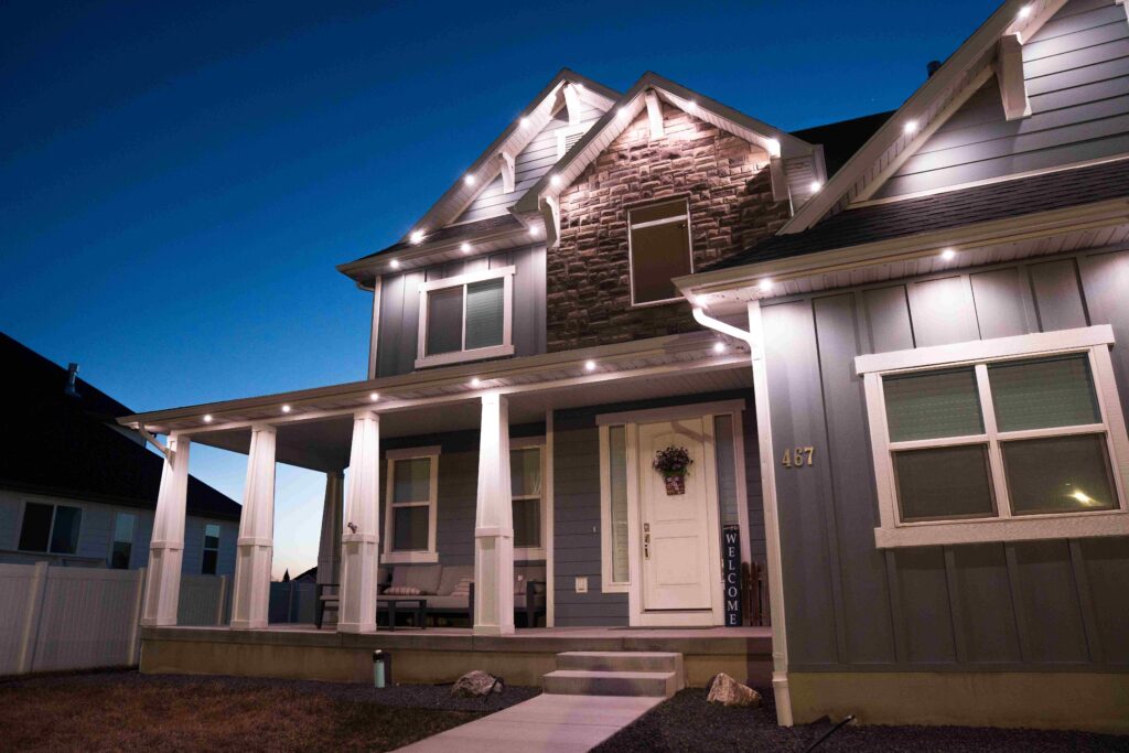 Accent white lights craftsman porch with permanent outdoor lighting