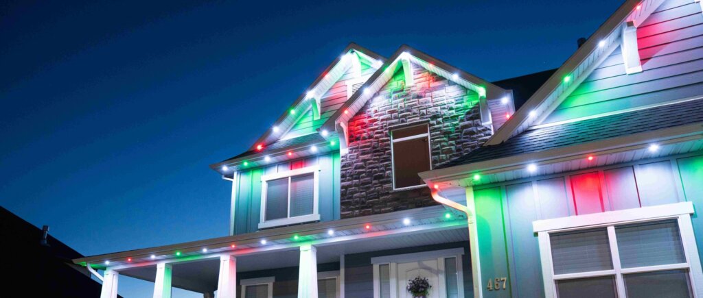 Christmas traditional home red green white with permanent outdoor lighting