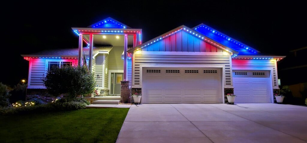 Fourth of july red white blue garage home with permanent outdoor lighting